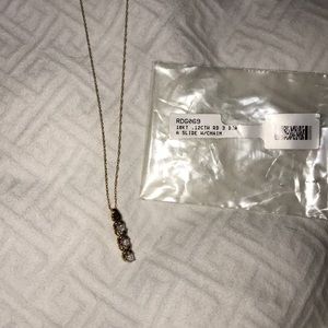 10KT gold necklace with 3 diamonds